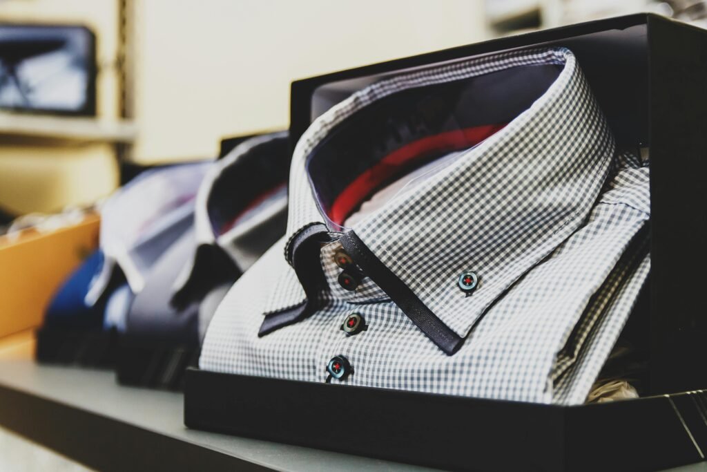 Set of formal checkered shirts neatly packed in boxes, ideal for business or gift.